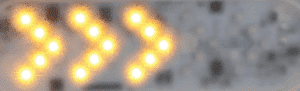 Arrows light up rapidly in sequence